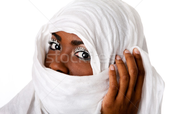 Female face in white scarf Stock photo © phakimata