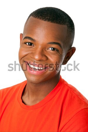 Derűs boldogság boldog jóképű fiatalember mosolyog Stock fotó © phakimata