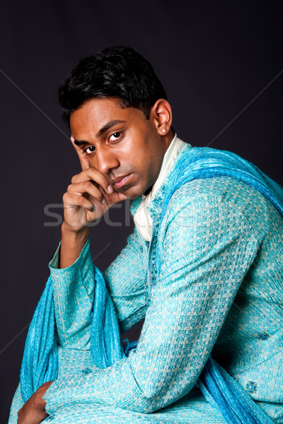 Hindu man sitting and thinking Stock photo © phakimata
