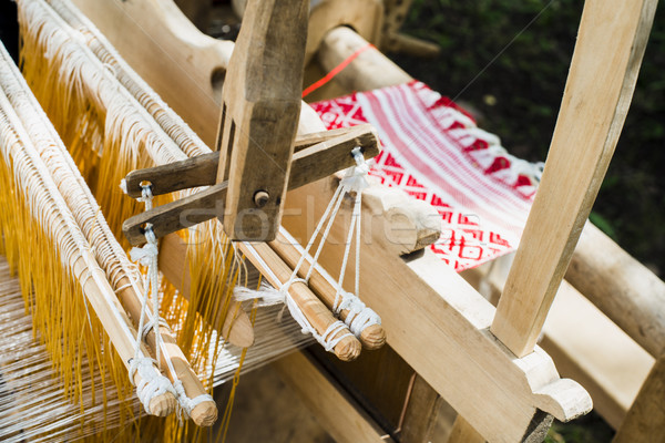 Weaving on a wooden loom Stock photo © Phantom1311