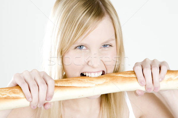 Retrato mujer baguette jóvenes comer Foto stock © phbcz