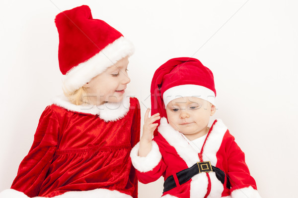 two little girls as Santa Clauses Stock photo © phbcz