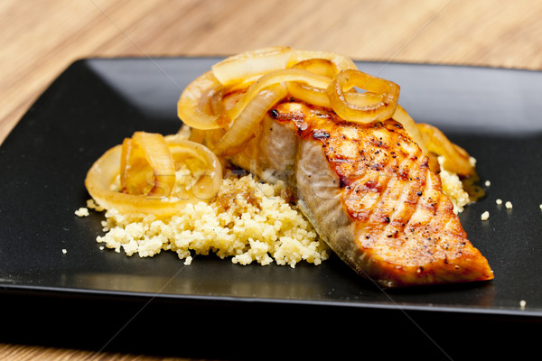 grilled salmon with burned onion and couscous Stock photo © phbcz