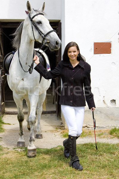 equestrian with horse at stable Stock photo © phbcz