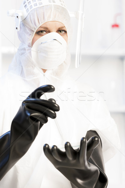 young woman wearing protective clothes in laboratory Stock photo © phbcz