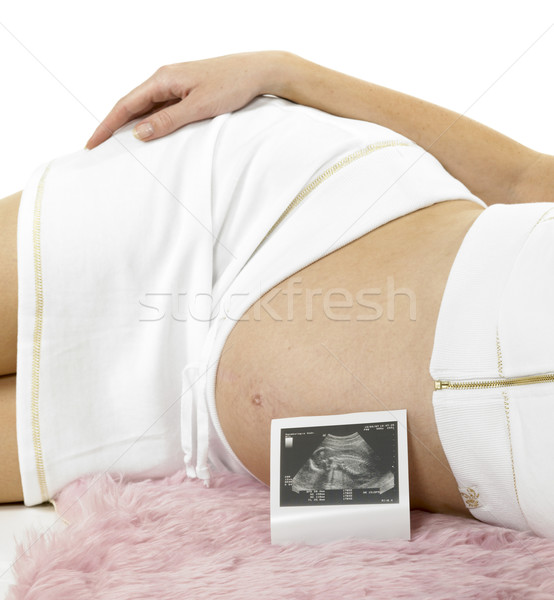 pregnat woman with a sonogram of her baby Stock photo © phbcz