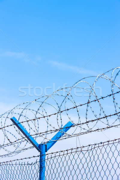 barbed wires at the airport Stock photo © phbcz