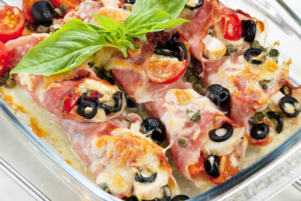 baked ham rolls filled with chicken meat and black olives Stock photo © phbcz