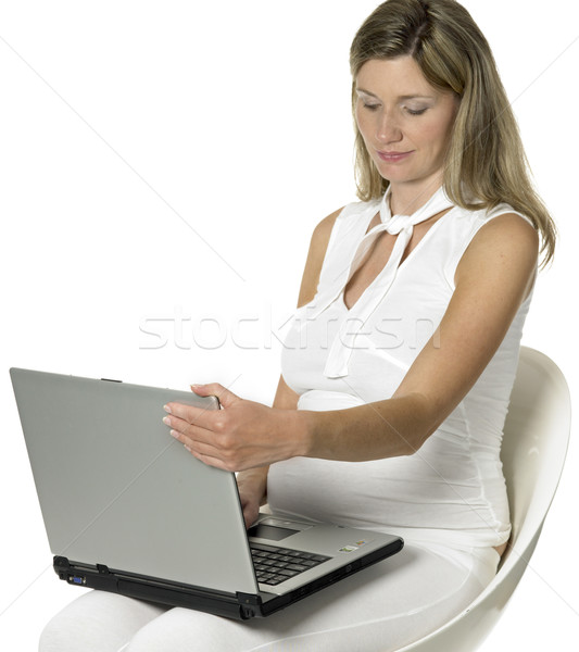 Stock photo: pregnat woman with notebook