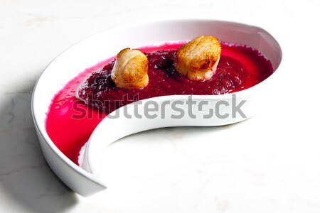 fried Saint Jacques molluscs on mashed red beet Stock photo © phbcz