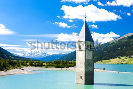 tower of sunken church in Resia lake, South Tyrol, Italy Stock photo © phbcz