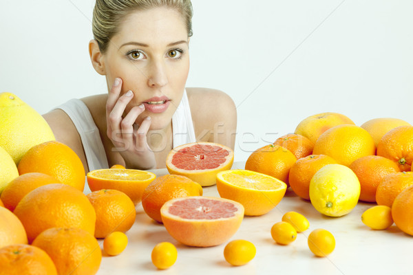Portré fiatal nő citrus gyümölcs étel nők fiatal Stock fotó © phbcz