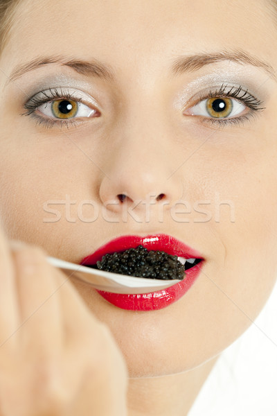 Portret vrouw zwarte kaviaar jonge eten Stockfoto © phbcz