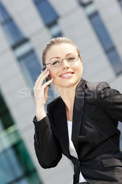 Stock photo: portrait of telephoning young businesswoman