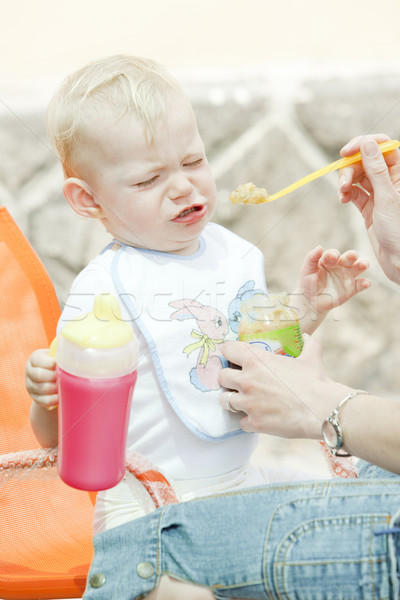 Stock photo: portrait of eating little girl