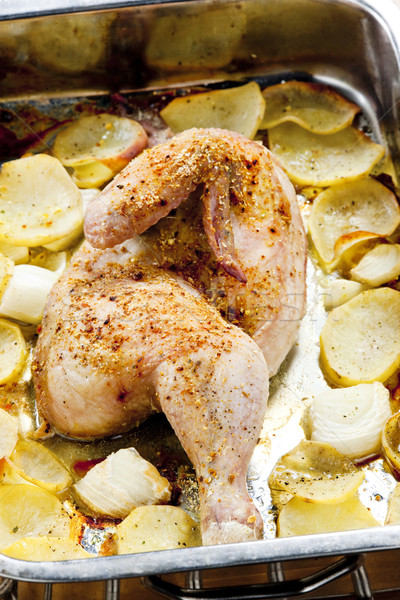 chicken baked with potatoes Stock photo © phbcz