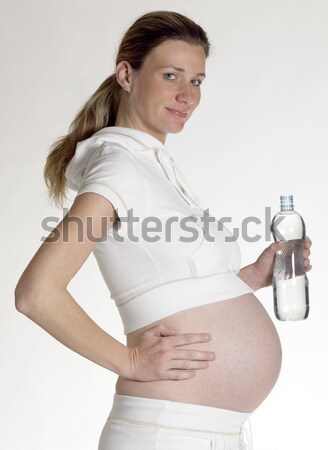 Foto stock: Mujer · botella · agua · embarazadas · jóvenes · solo