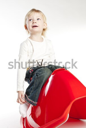 Petite fille séance Swing fille enfant jouet [[stock_photo]] © phbcz