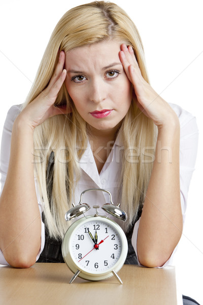 portrait of businesswoman with an alarm clock Stock photo © phbcz