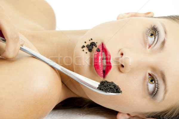 Retrato mulher preto caviar jovem alimentação Foto stock © phbcz