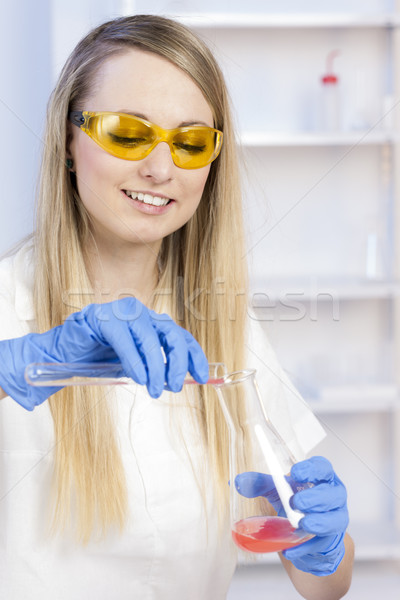 young woman doing experiment in laboratory Stock photo © phbcz