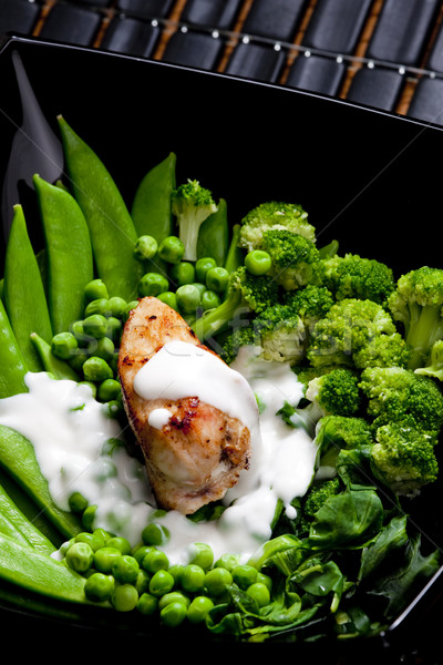 chicken meat on green vegetables Stock photo © phbcz