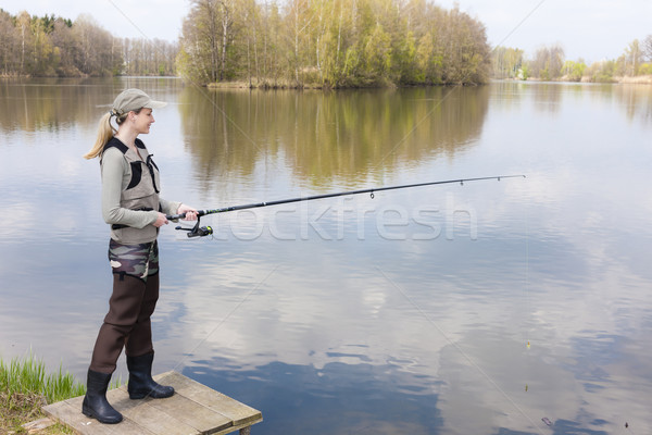 Donna pesca pier stagno donne relax Foto d'archivio © phbcz