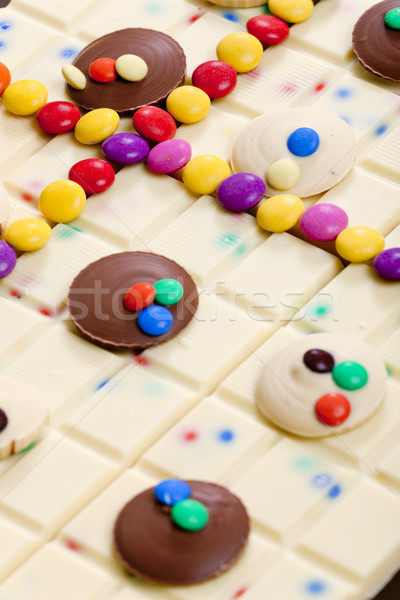 still life of white chocolate with smarties Stock photo © phbcz