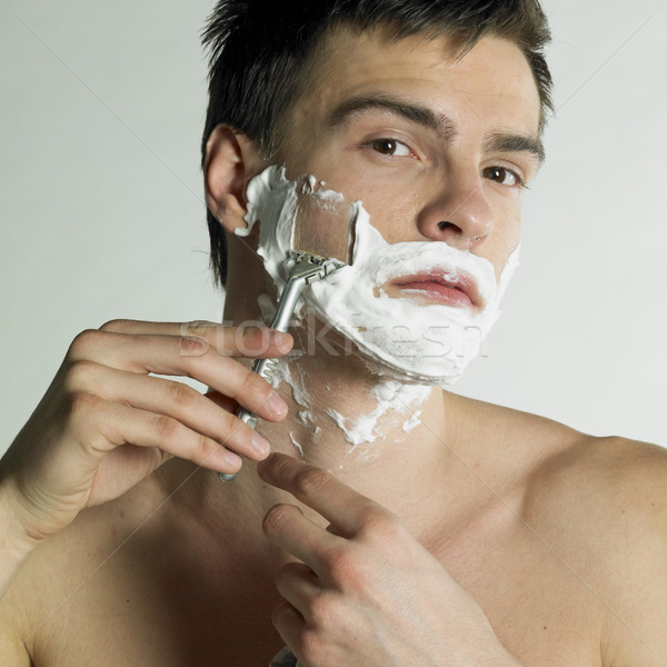 portrait of shaving man Stock photo © phbcz