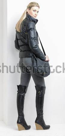 Kobieta lateks posiedzenia schody moda czarny Zdjęcia stock © phbcz