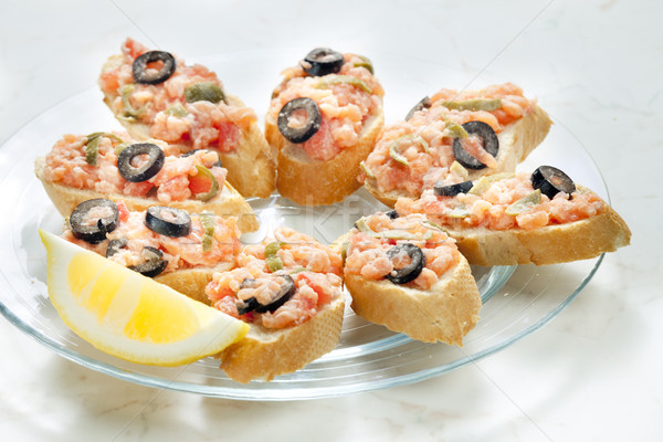 salmon tartare with capers and black olives Stock photo © phbcz