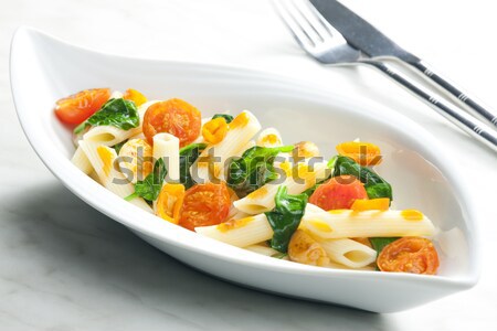 pasta orecchiette with bacon and champignons Stock photo © phbcz