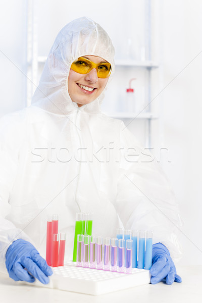 young woman wearing protective coat in laboratory Stock photo © phbcz