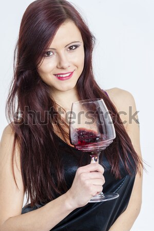 portrait of young woman with a glass of red wine Stock photo © phbcz