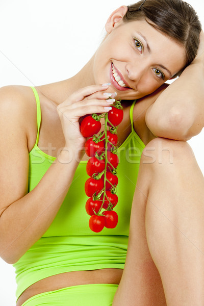 portrait of woman holding tomatoes Stock photo © phbcz
