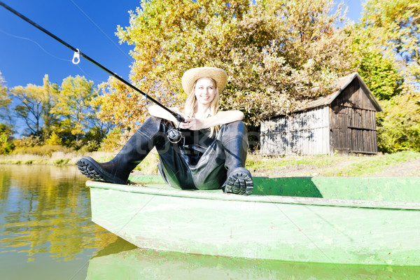 Pesca mujer sesión barco mujeres femenino Foto stock © phbcz