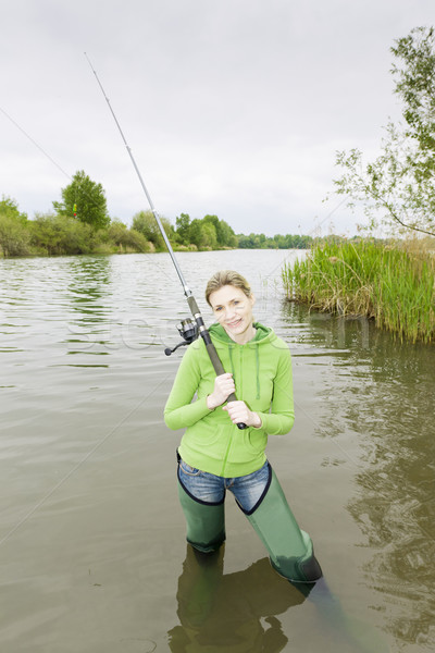 woman fishing in pond Stock photo © phbcz