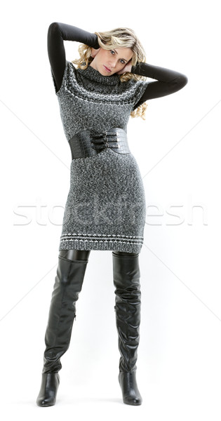 standing woman wearing dress and black boots Stock photo © phbcz