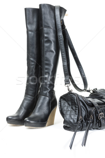 fashionable platform black boots with a handbag Stock photo © phbcz
