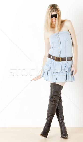 standing woman wearing fashionable brown boots Stock photo © phbcz