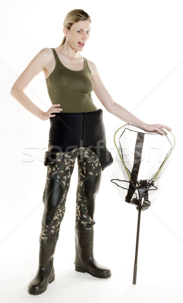 fisher woman with fishing net in studio Stock photo © phbcz