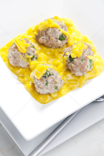 minced meat and herbs balls in apple and curry sauce Stock photo © phbcz