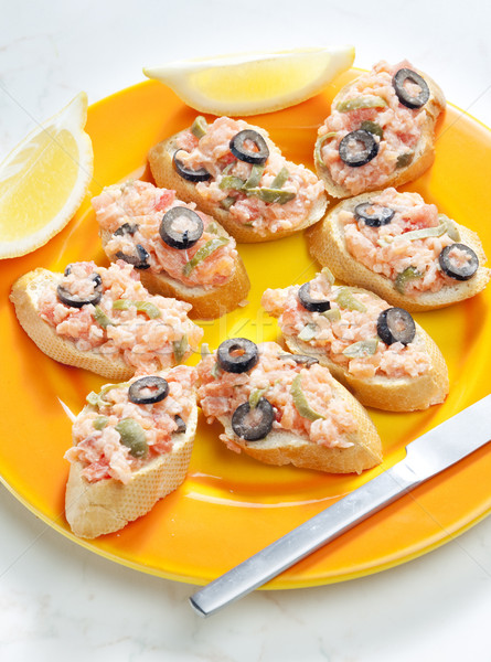 salmon tartare with capers and black olives Stock photo © phbcz