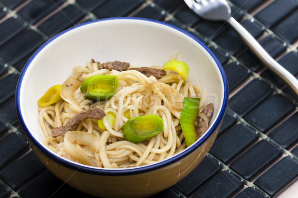 Stock photo: Asian noodles with beef meat and leek