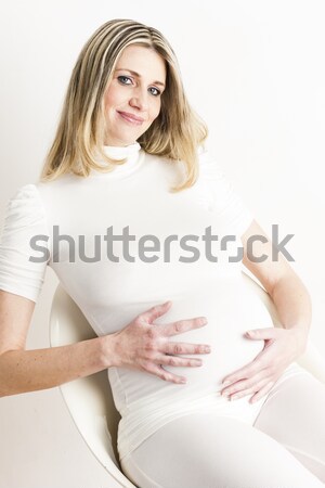 Portret în picioare femeie gravida lenjerie femei Imagine de stoc © phbcz