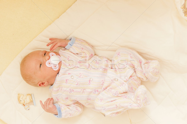 lying newborn baby girl Stock photo © phbcz