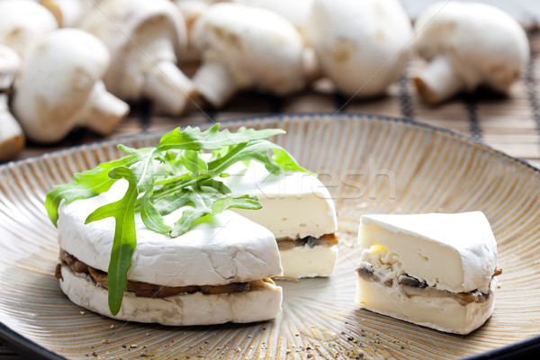 cheese brie filled with roasted mushrooms Stock photo © phbcz