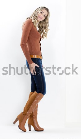 standing woman wearing fashionable brown boots Stock photo © phbcz