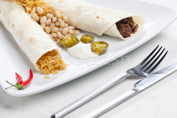 beef burritos with beans and rice Stock photo © phbcz