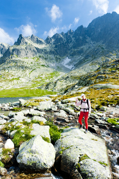 Stock photo: woman backpacker at Five Spis Tarns, Vysoke Tatry (High Tatras),